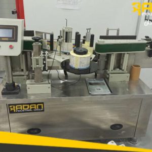 Round label applicator machine