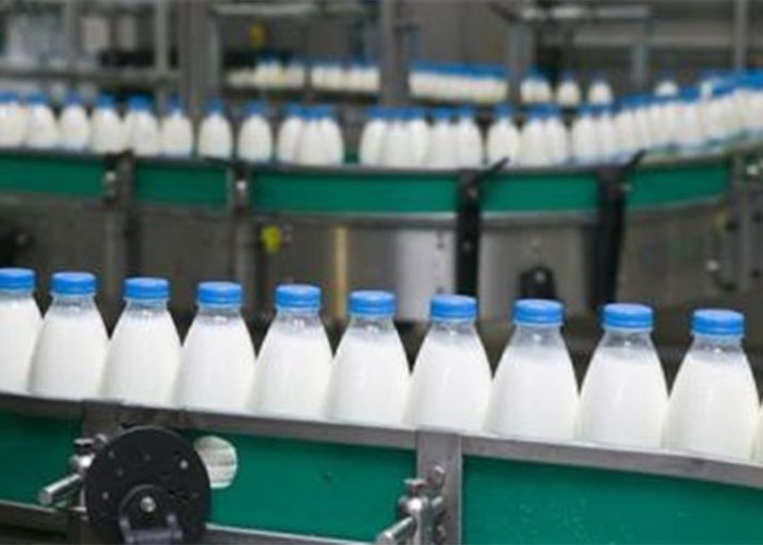 دستگاه پرکن بطری شیر ایرانی